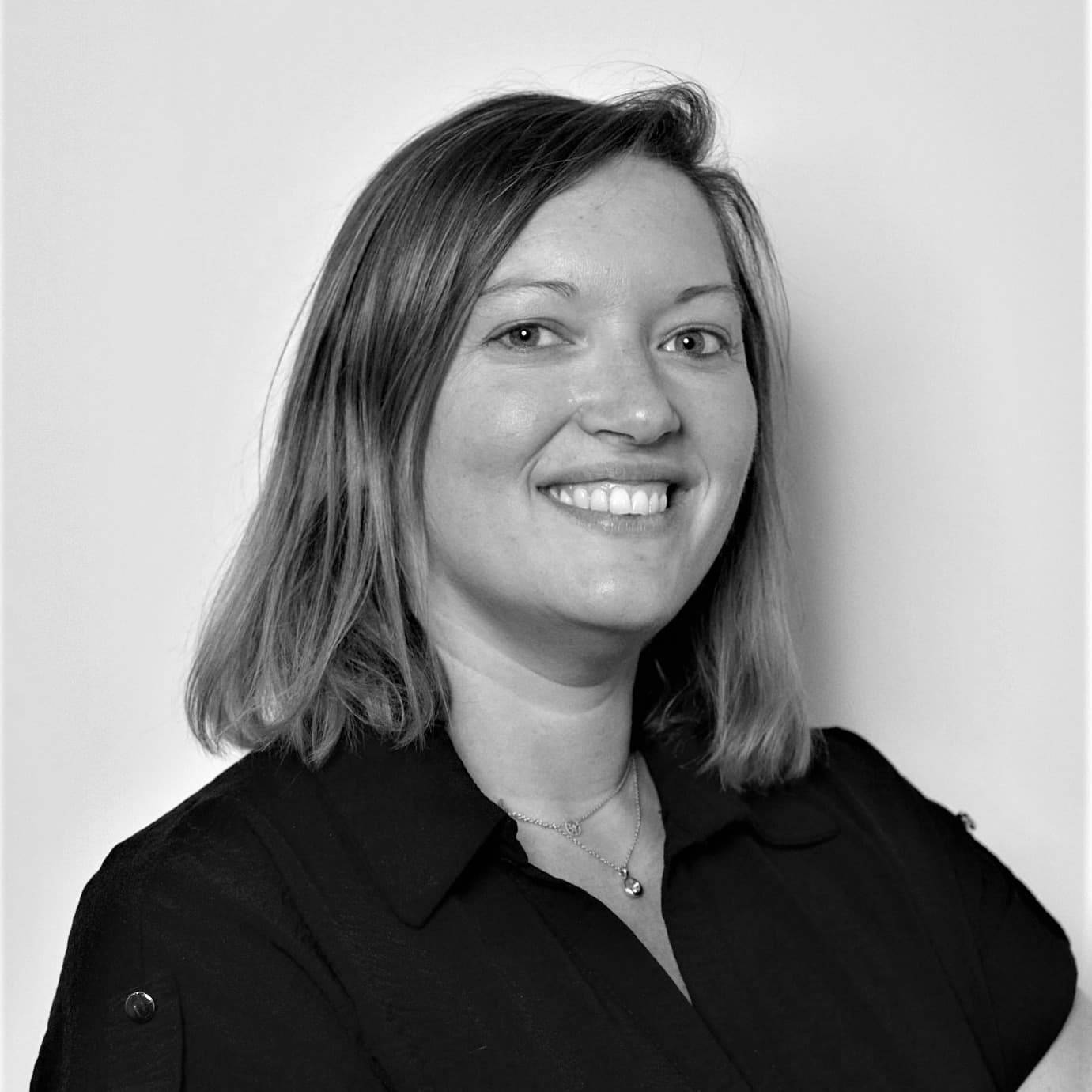 CAMILLE F.