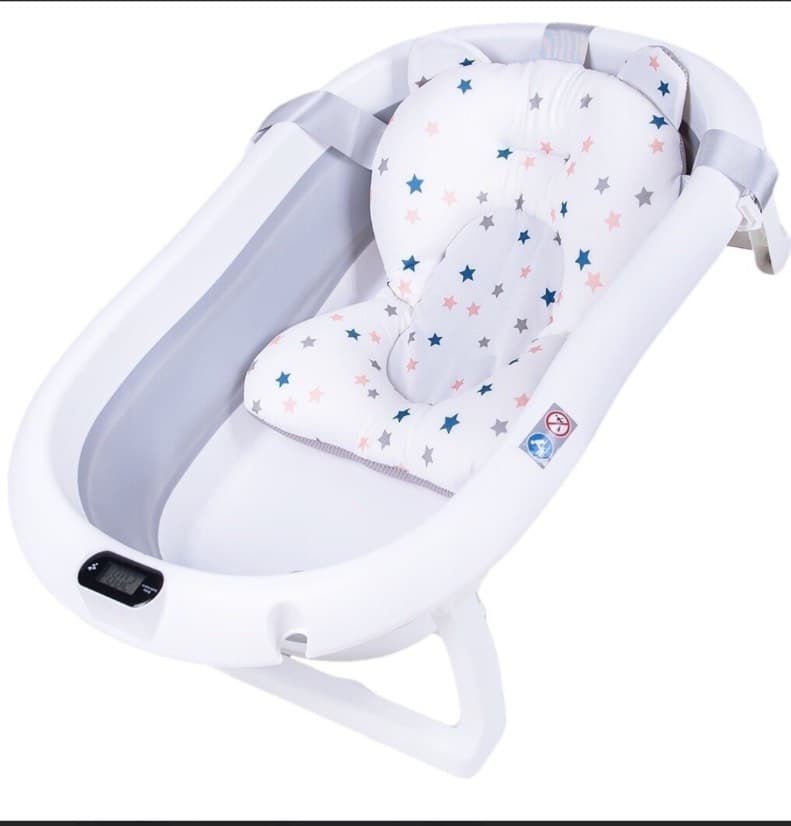 bathtubs MT with a thermometer and a pillow